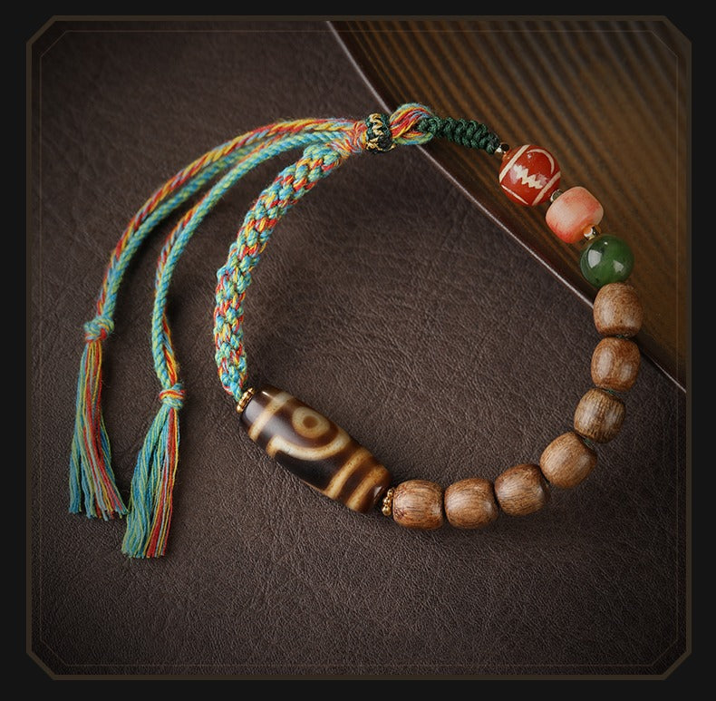 Zen Healing Tibetisches Adlerholz-Achat-Dzi-Perlen-Schutz-Geflochtenes Armband